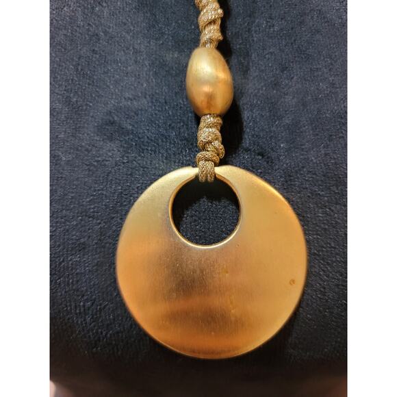 Women's Gold Circle Pendant Necklace with Braided Cord and Unique Bead Design - Picture 3 of 5